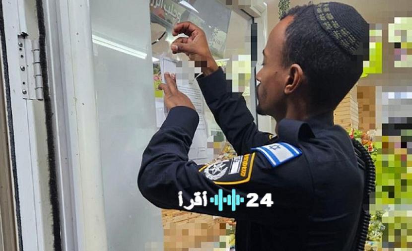 ختم محل تجاري بالطيرة بحجة تشغيل عمال من الضفة