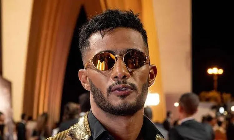 محمود عزب يكشف سر غضب علي الحجار من محمد رمضان